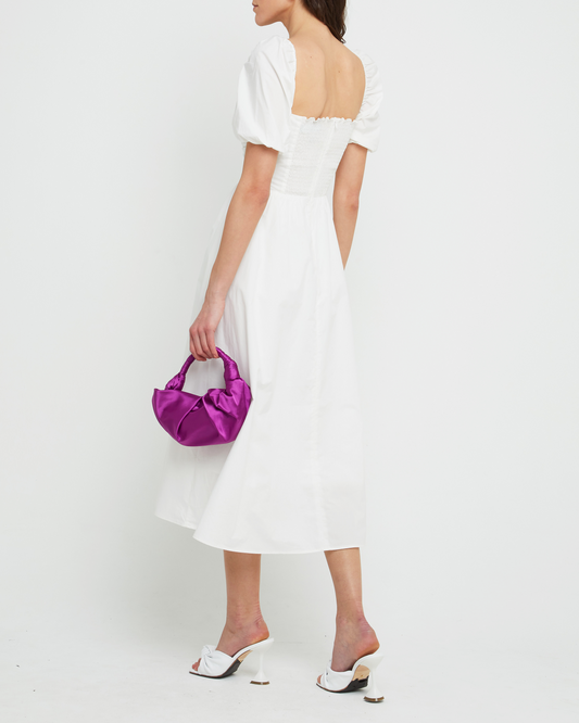 Second image of River Dress, a white midi dress, square neckline, short puff sleeves, gathered bodice