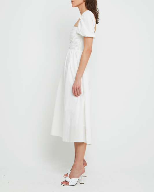 Third image of River Dress, a white midi dress, square neckline, short puff sleeves, gathered bodice