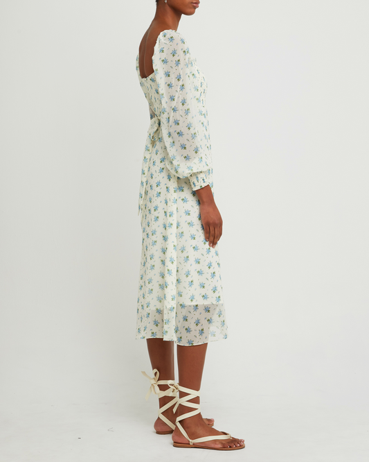 Third image of Savannah Dress, a blue midi dress, sheer, chiffon, floral, long sleeves, square neckline