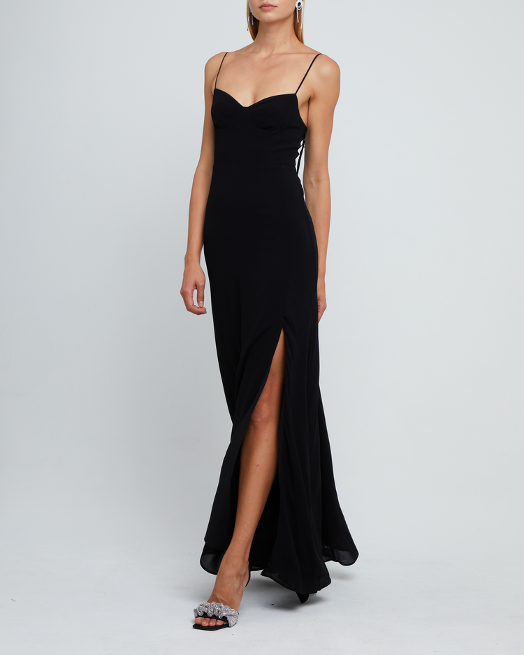 Fourth image of Delphi Dress, a black maxi-length bridesmaid dress with sweetheart neckline, cup detail, side slit, cupped sweetheart neckline, back zipper, back smocking, and adjustable tie string straps